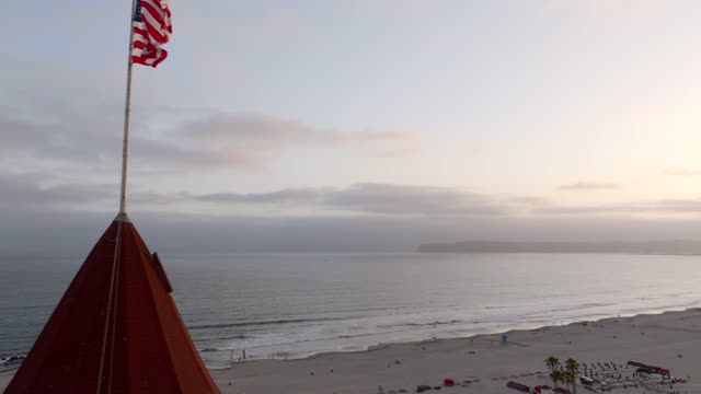 Elevated view of the beach, palm trees and the ocean at Coronado Beach.