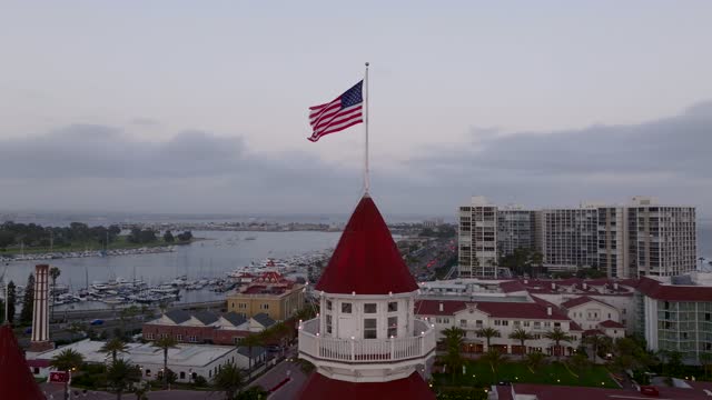 Low aerial view of the harbor, boats and the bay at Coronado Beach.