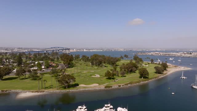 Aerial view of a park, the bridge and boats at Glorietta Bay.