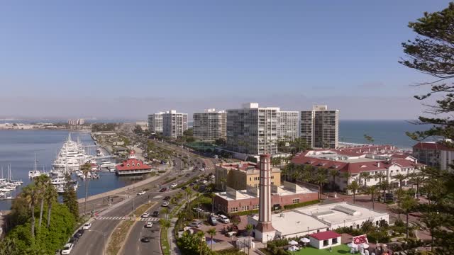 Aerial view of the harbor, boats and palm trees at Coronado Beach.