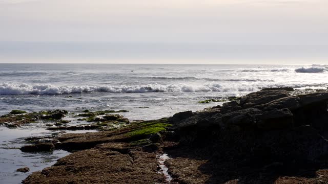 The cliffs, the surf and the ocean at Bird Rock.