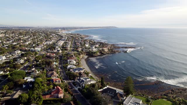 Aerial view of a residential street, palm trees and the ocean at Bird Rock.