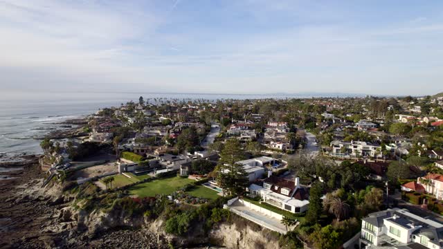 Aerial view of a residential street, palm trees and the ocean at Bird Rock.