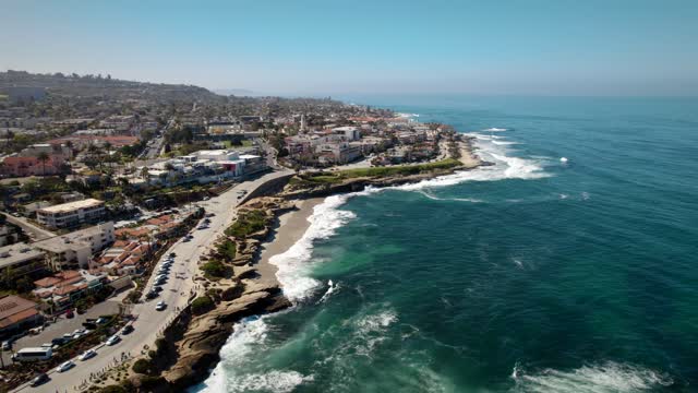Aerial view of the cliffs, the ocean and homes at La Jolla Cove.