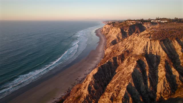 Aerial view of the cliffs, the ocean and homes at Black’s Beach.