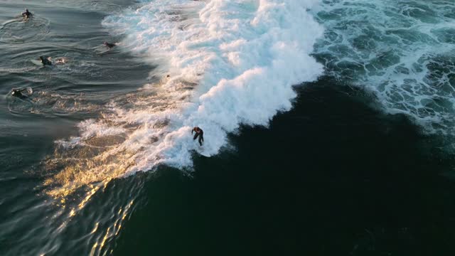 Surfers at Windansea Beach in La Jolla San Diego California during Sunset | Drone Video – 9