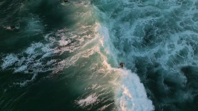 Surfers at Windansea Beach in La Jolla San Diego California during Sunset | Drone Video – 8