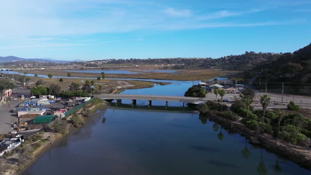 Aerial view of the country inland, the bridge and traffic in Del Mar.