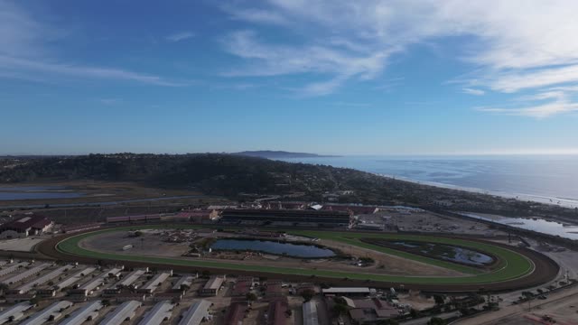 Aerial view of the country inland, the ocean and homes in Del Mar.