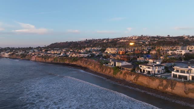 Aerial view of the cliffs, the surf and the ocean at Bird Rock.