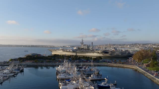 Low aerial view of the harbor, boats and the bay at Embarcadero, with boats out.