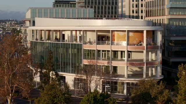 Low aerial view of the downtown streets, the buildings and the city at Embarcadero.