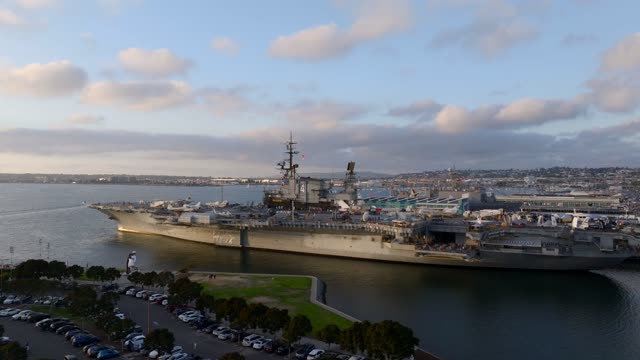 Low aerial view of the harbor, the skyline and boats at Embarcadero.