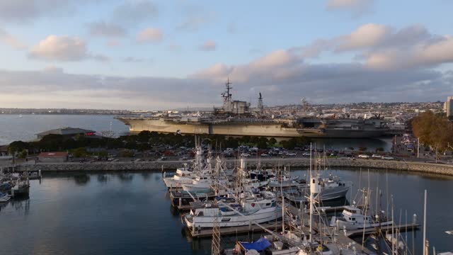 Low aerial view of the harbor, boats and the bay at Embarcadero, with boats out.