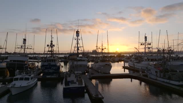 Low aerial view of the harbor, boats and the bay at Embarcadero.