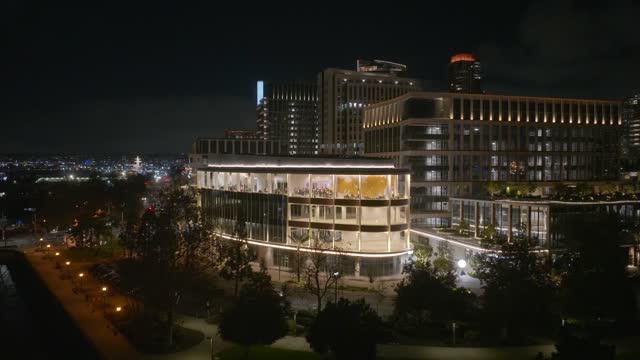 Low aerial view of the downtown streets, the skyline and the buildings at Embarcadero.