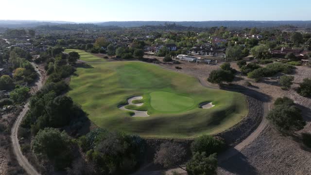 Aerial view of the country inland, homes and open country in Santaluz.