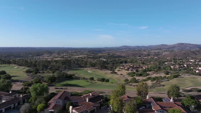 Aerial view of the country inland, homes and the buildings in Santaluz.