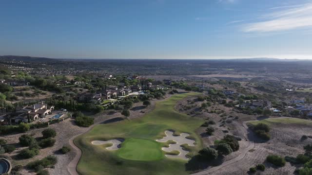 Aerial view of the country inland, homes and the buildings in Santaluz.