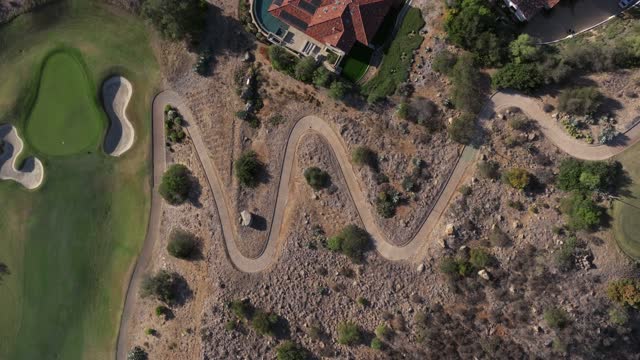 Aerial view of the country inland, homes and the buildings in Santaluz.