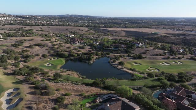 Aerial view of the country inland, homes and open country in Santaluz.