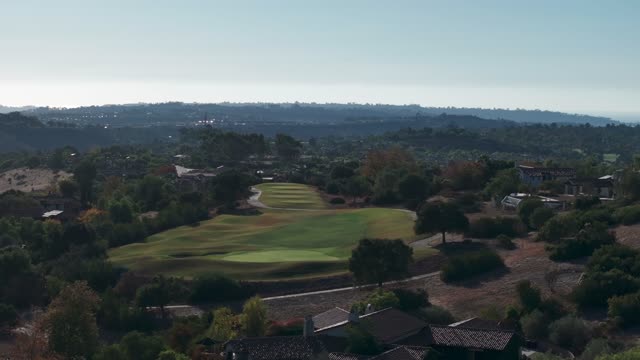 Aerial view of the country inland, homes and the buildings in Santaluz.