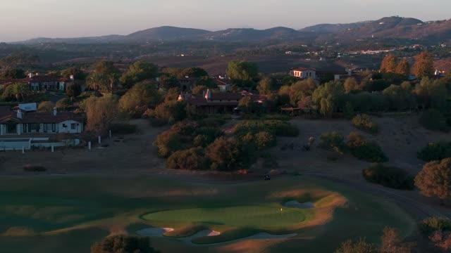 Aerial view of the country inland, homes and open country in Santaluz.