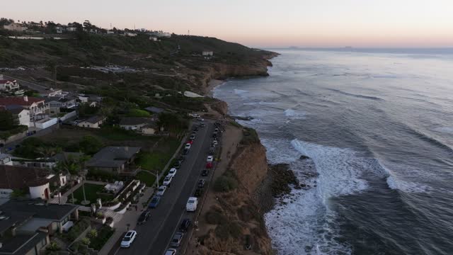 Aerial view of the cliffs, the surf and the ocean at Sunset Cliffs.