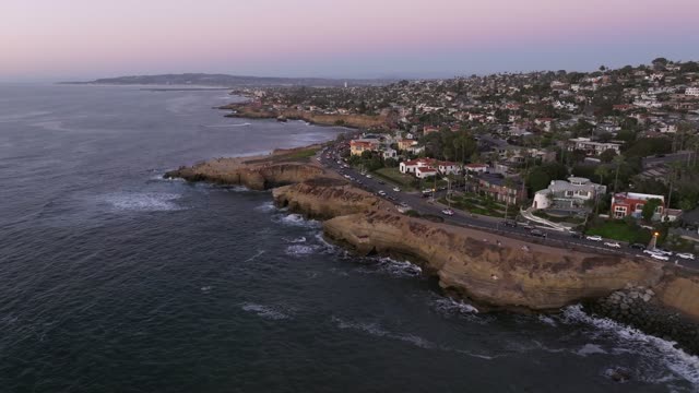 Aerial view of the cliffs, the ocean and homes at Sunset Cliffs.