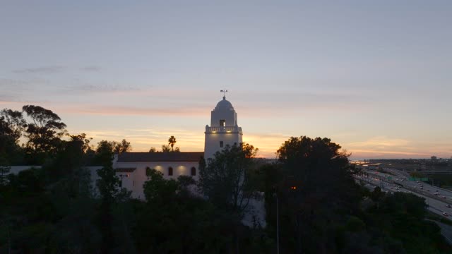 The Junipero Serra Museum in Presidio Park in Mission Hills overlooking Mission Valley during Sunset | Drone Video – 7
