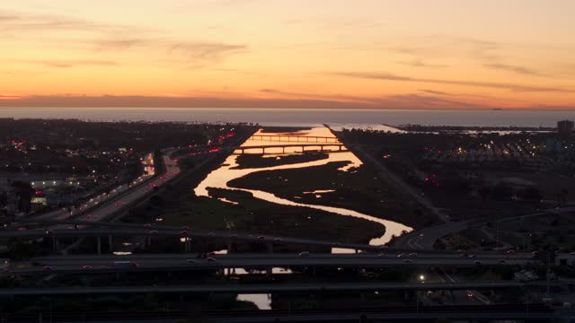 Aerial view of the country inland, the bridge and the ocean in Mission Bay.