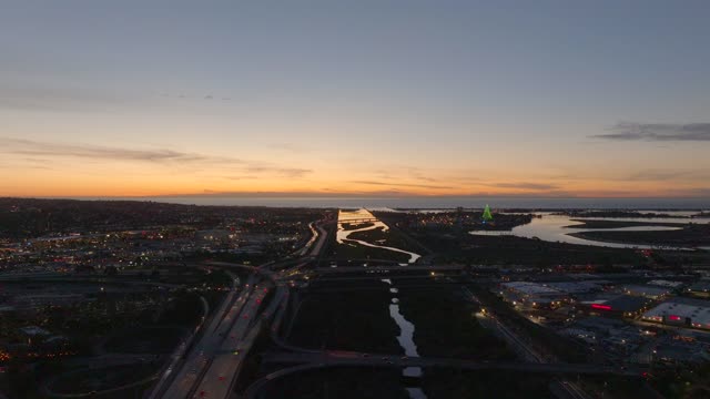 Aerial view of the country inland, the bay and homes in Mission Bay.