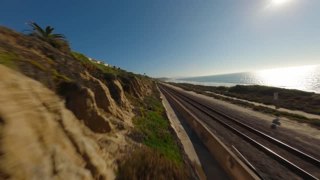 Flight over the beach cliffs and train tracks in Del Mar | FPV Drone Video – 4