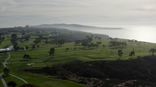 Aerial view of the country inland, the ocean and the cliffs at Torrey Pines.