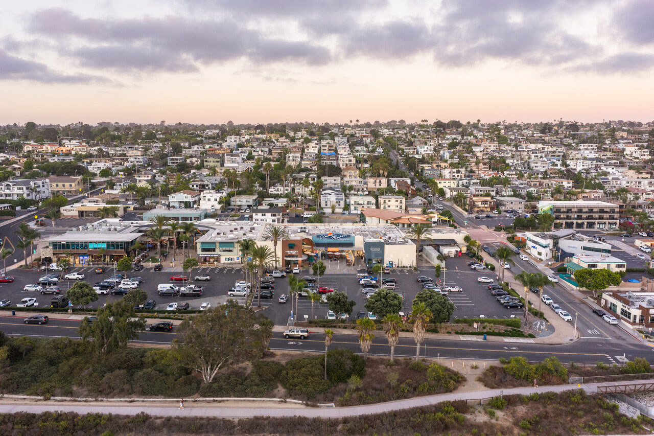 Aerial view of a residential street, palm trees and homes in Cardiff.