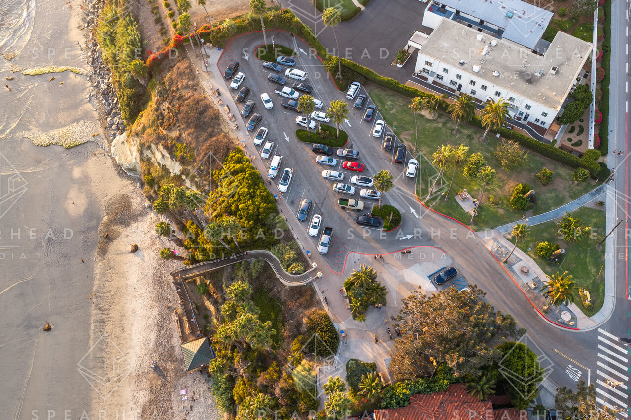 Aerial view of the beach, palm trees and the ocean at Swamis.