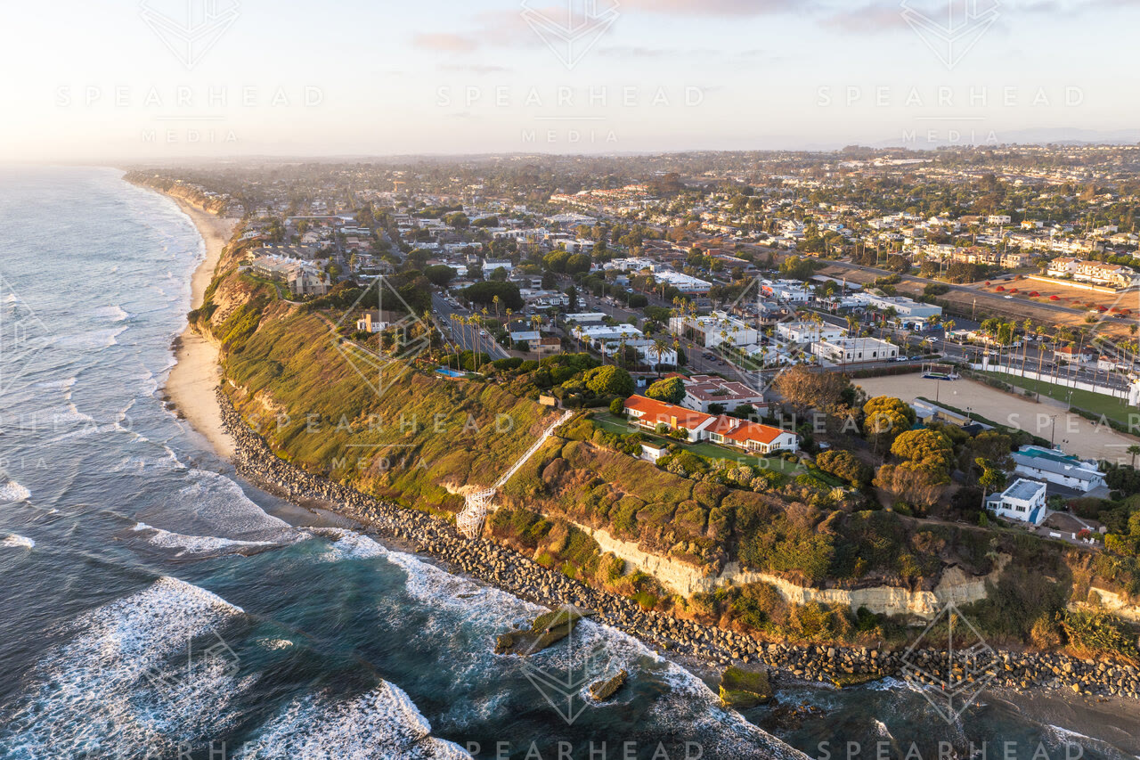Aerial view of the cliffs, the surf and the ocean at Swamis.